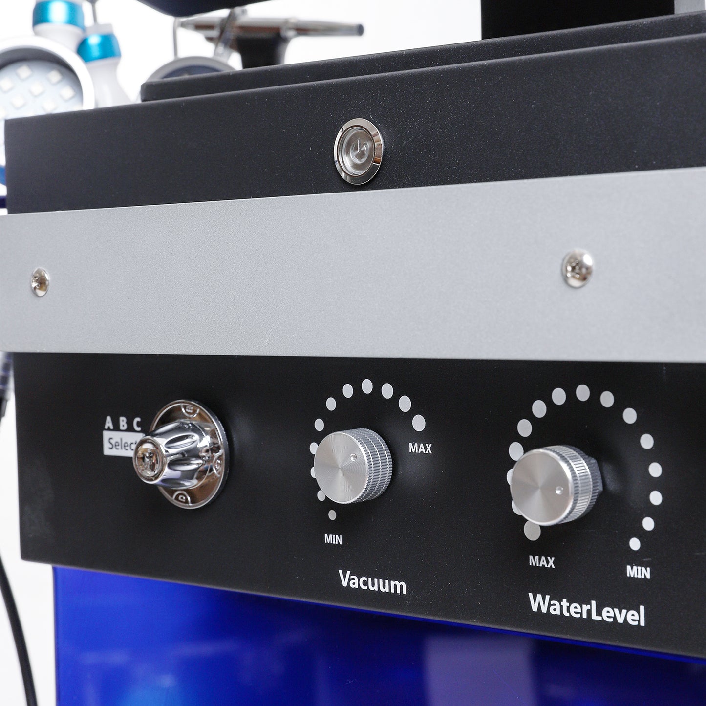 Close-up of Hydra Smart Beauty control panel showing vacuum and water level dials for facial treatment settings