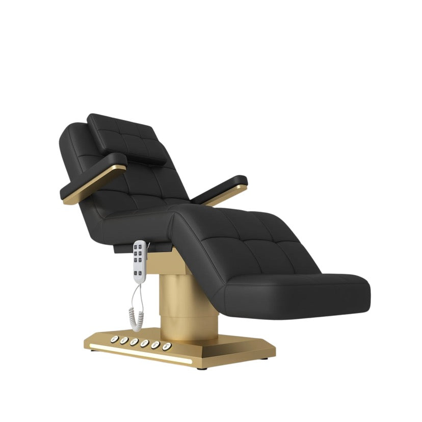 Black and gold recliner chair on a white background
