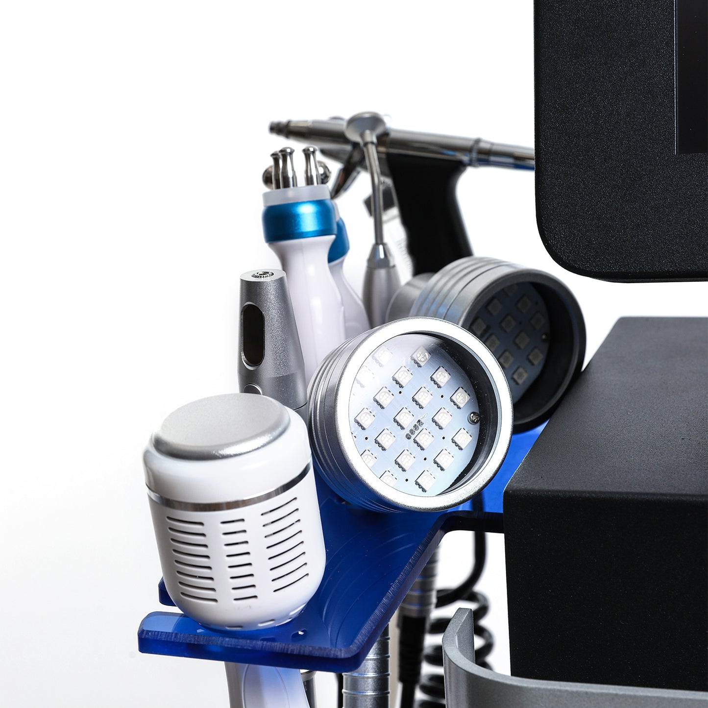 Hydra Smart Beauty device handpieces including LED light, RF, spray gun, and ultrasound tools for facial treatments