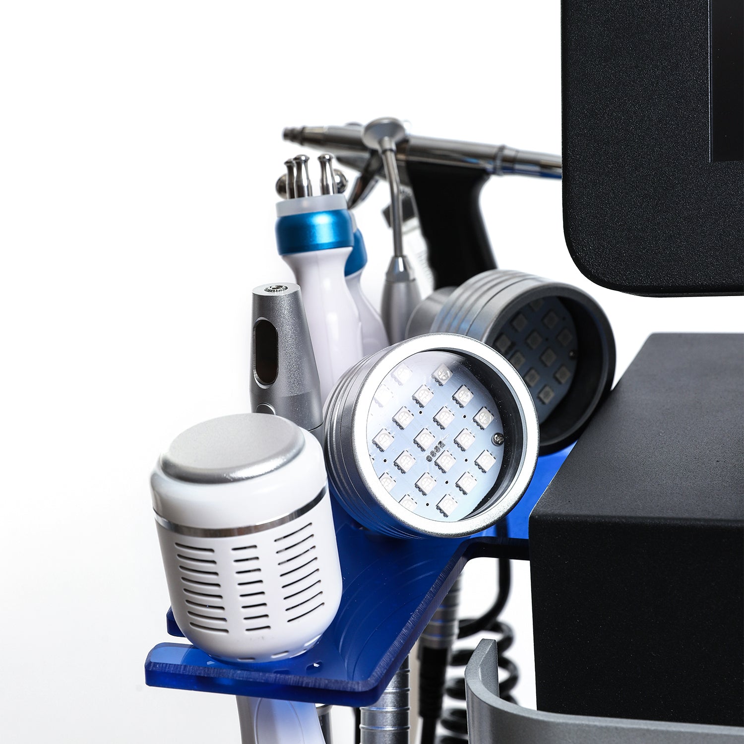 Hydra Smart Beauty device handpieces including LED light, RF, spray gun, and ultrasound tools for facial treatments