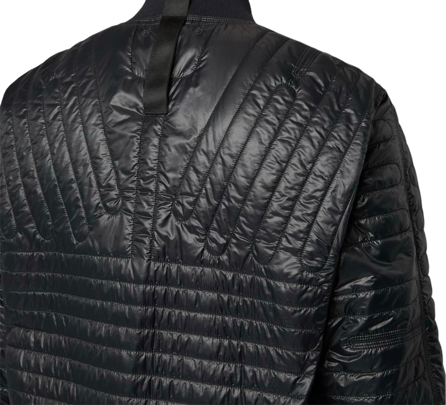Stone Island lightweight bomber with wind resistance, anti-drop finish, and sleek insulated design.