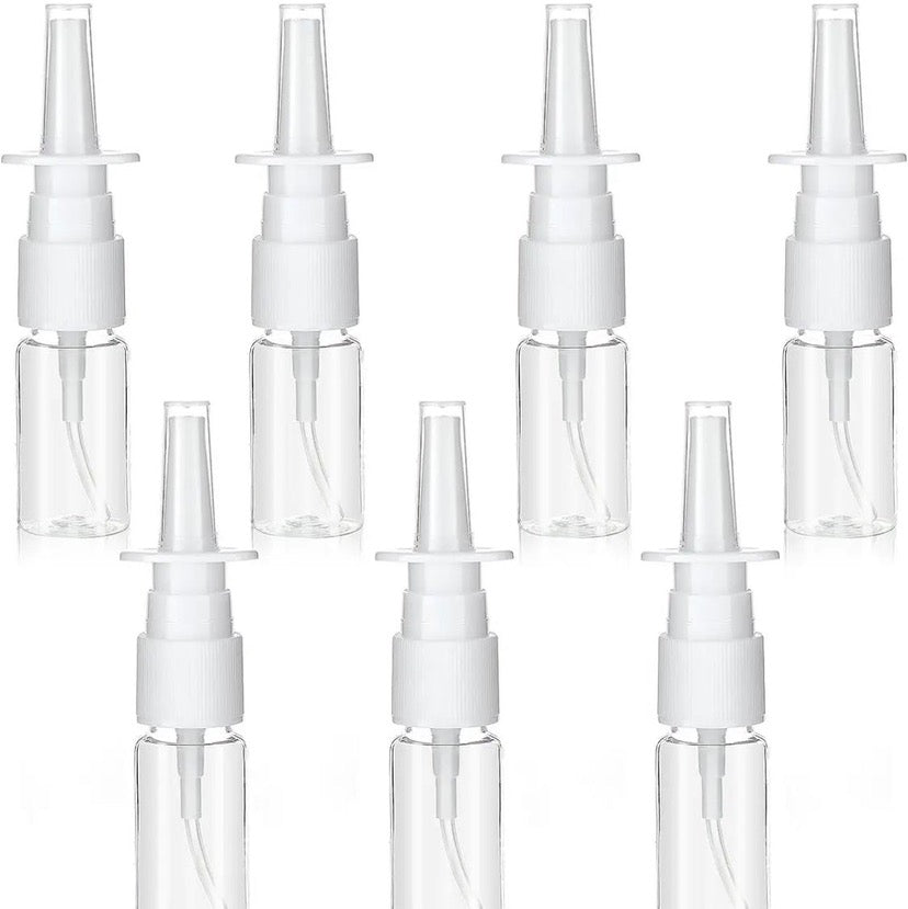 Set of refillable nasal spray containers for essential oils or saline solutions.
